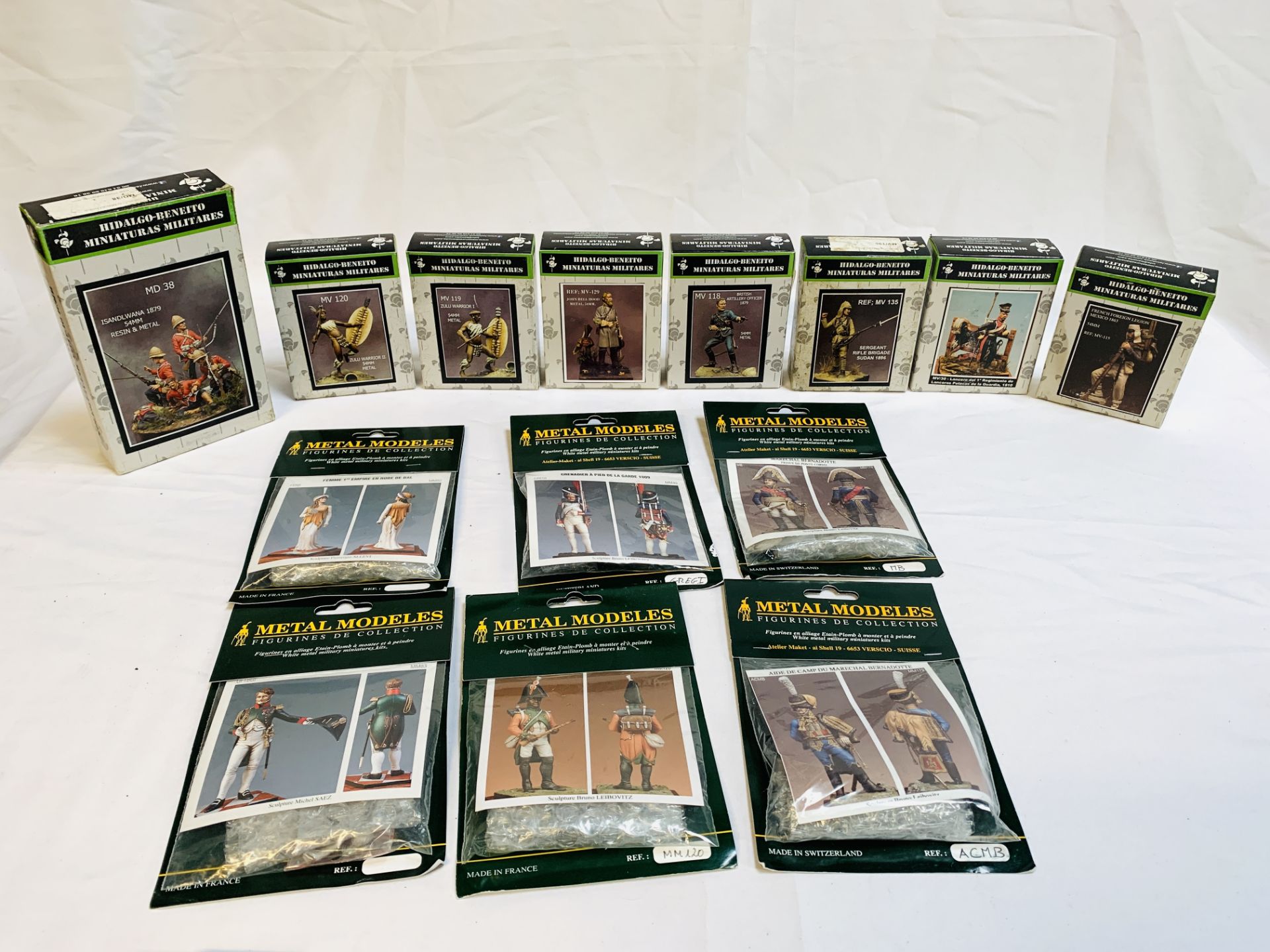 A quantity of metal figurines