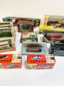 Thirteen boxed model diecast cars and lorries