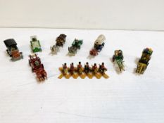 Collection of nine German made miniature model horses and carts, and 2 vehicles.