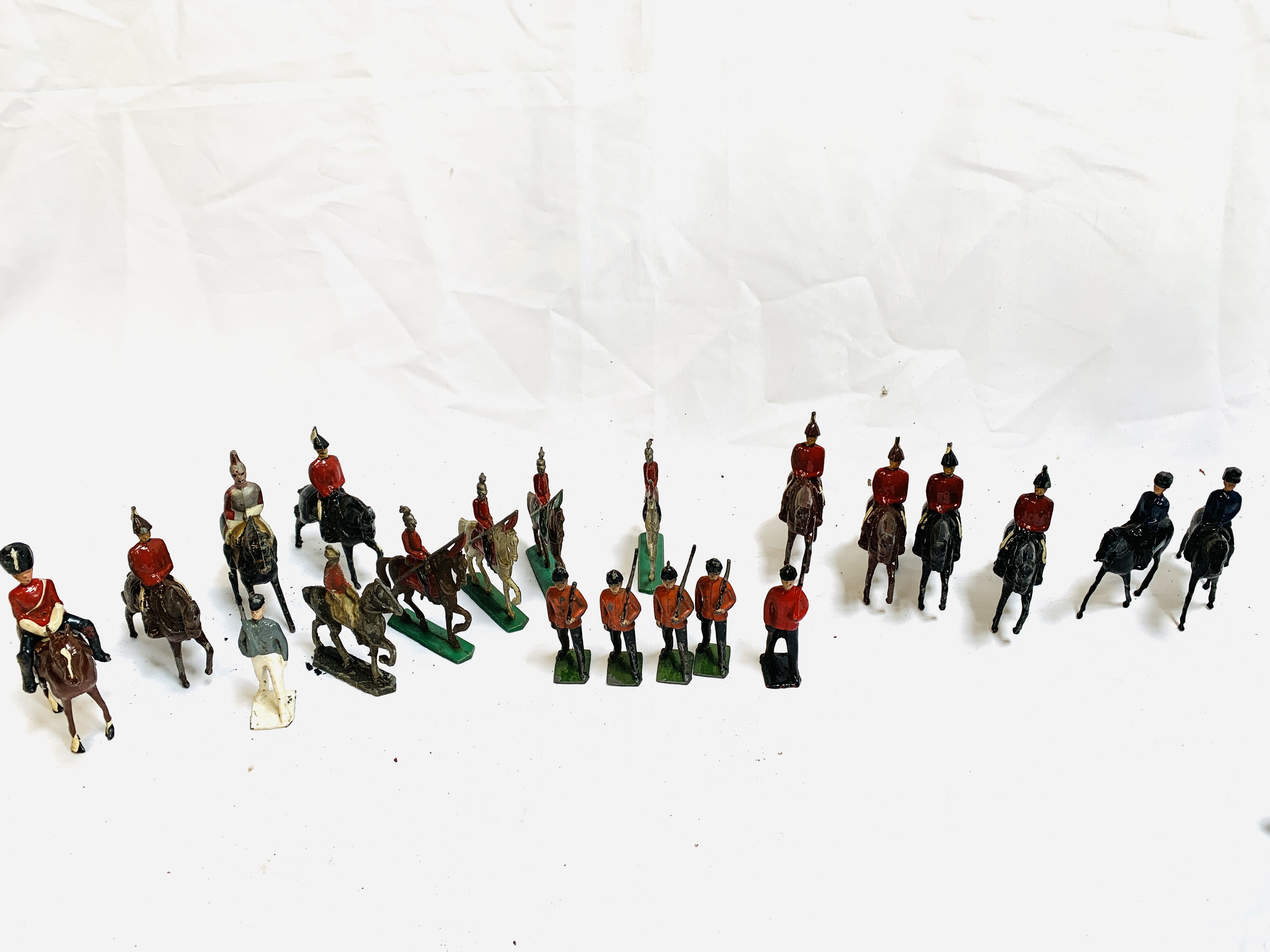 Collection of painted metal soldiers, mainly calvary