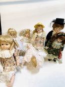 A collection of 7 dolls, including Leonardo Collection