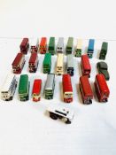 Twenty-two die-cast model double-decker buses; a Solido model car; and a steam traction engine.