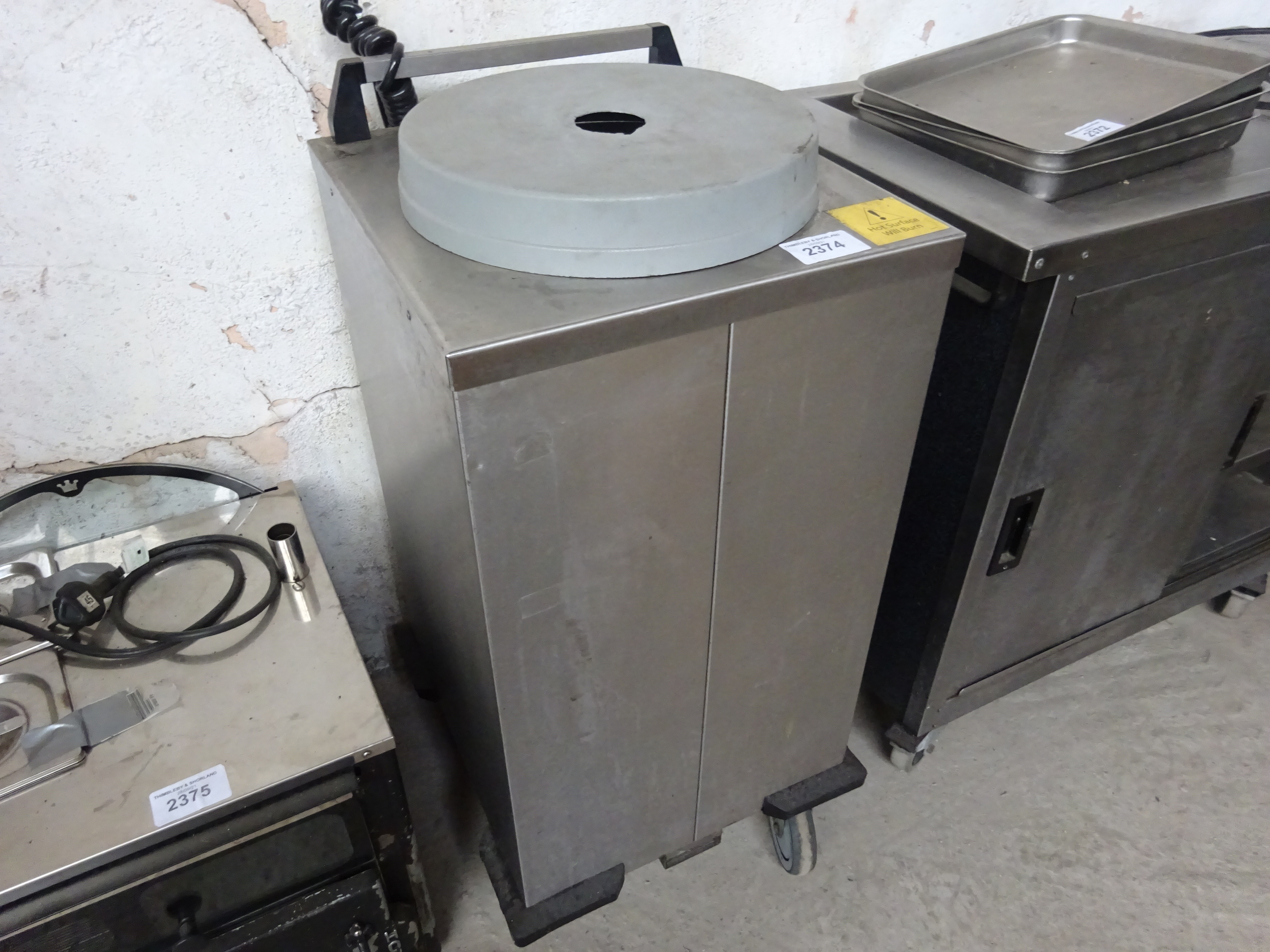 Electric plate lowerator