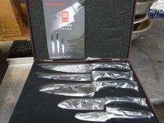 Five piece knife set in wooden box
