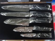 Five piece knife set in wooden box