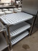 Three tier table with perforations