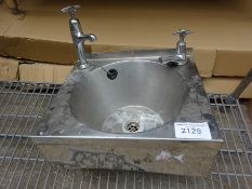 Hand sink with taps