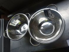 Two stainless steel colanders