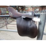 Brown leather hunting saddle.