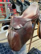 Brown leather John Whittaker saddle, 17.5". This item carries VAT.
