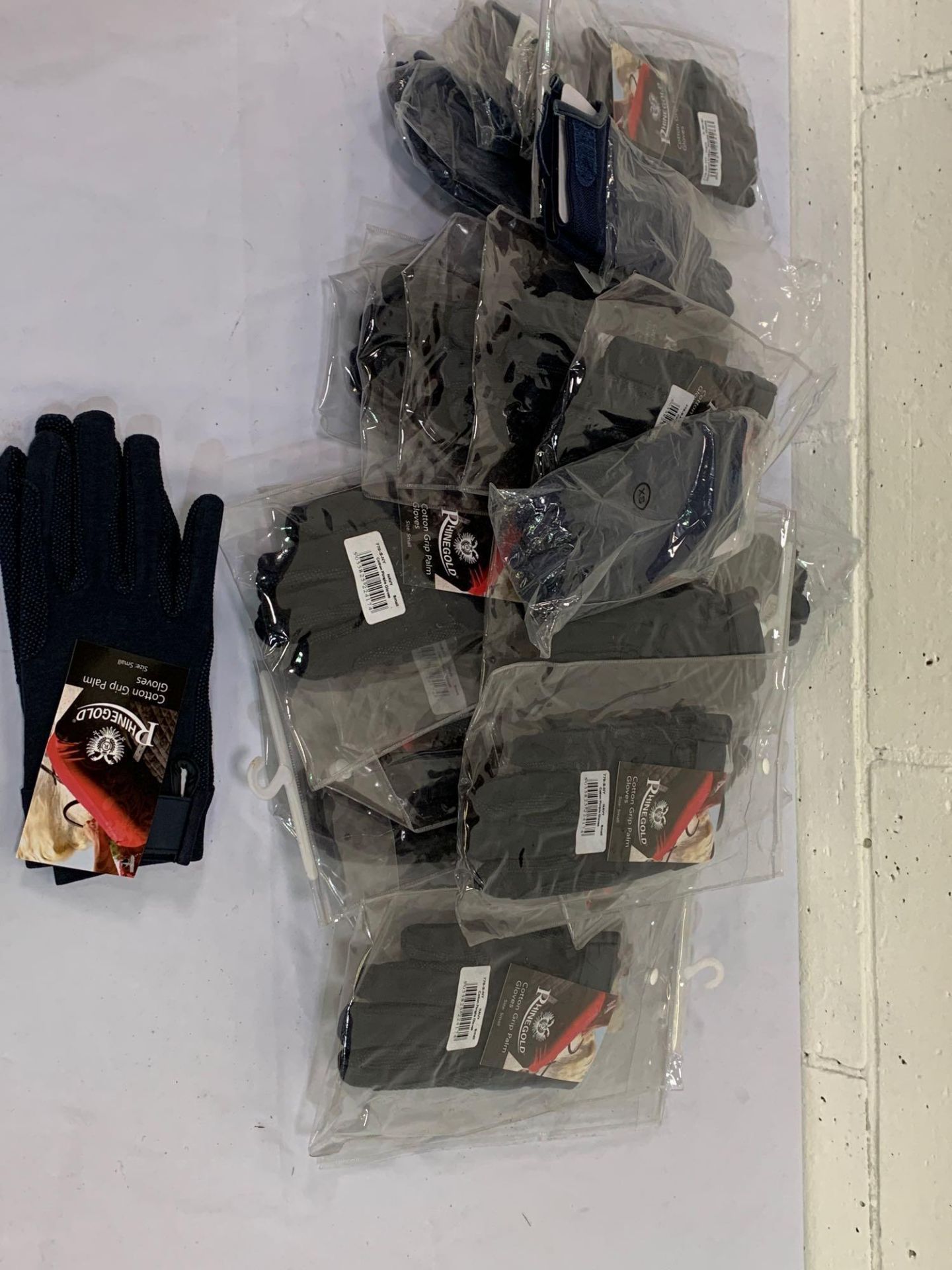 Twenty-three pairs of gloves