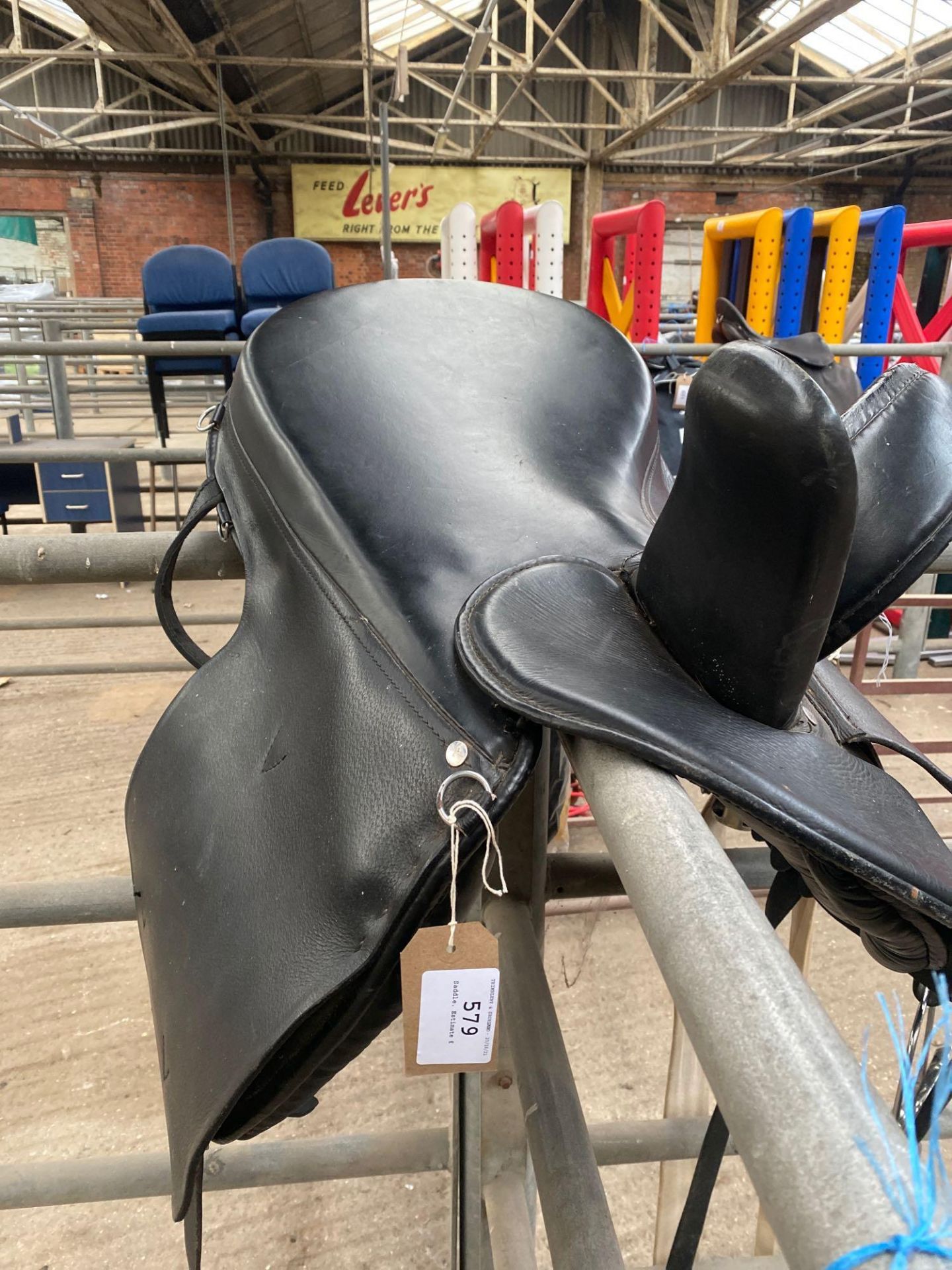 Black leather side saddle c/w stirrup and girths, length 17". This item carries VAT. - Image 2 of 3