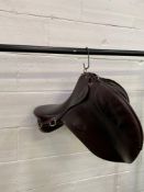 An Army saddle by Barnsby. This item carries VAT.