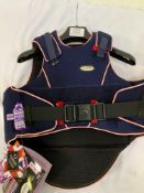 Two Champion body protectors, size child/large