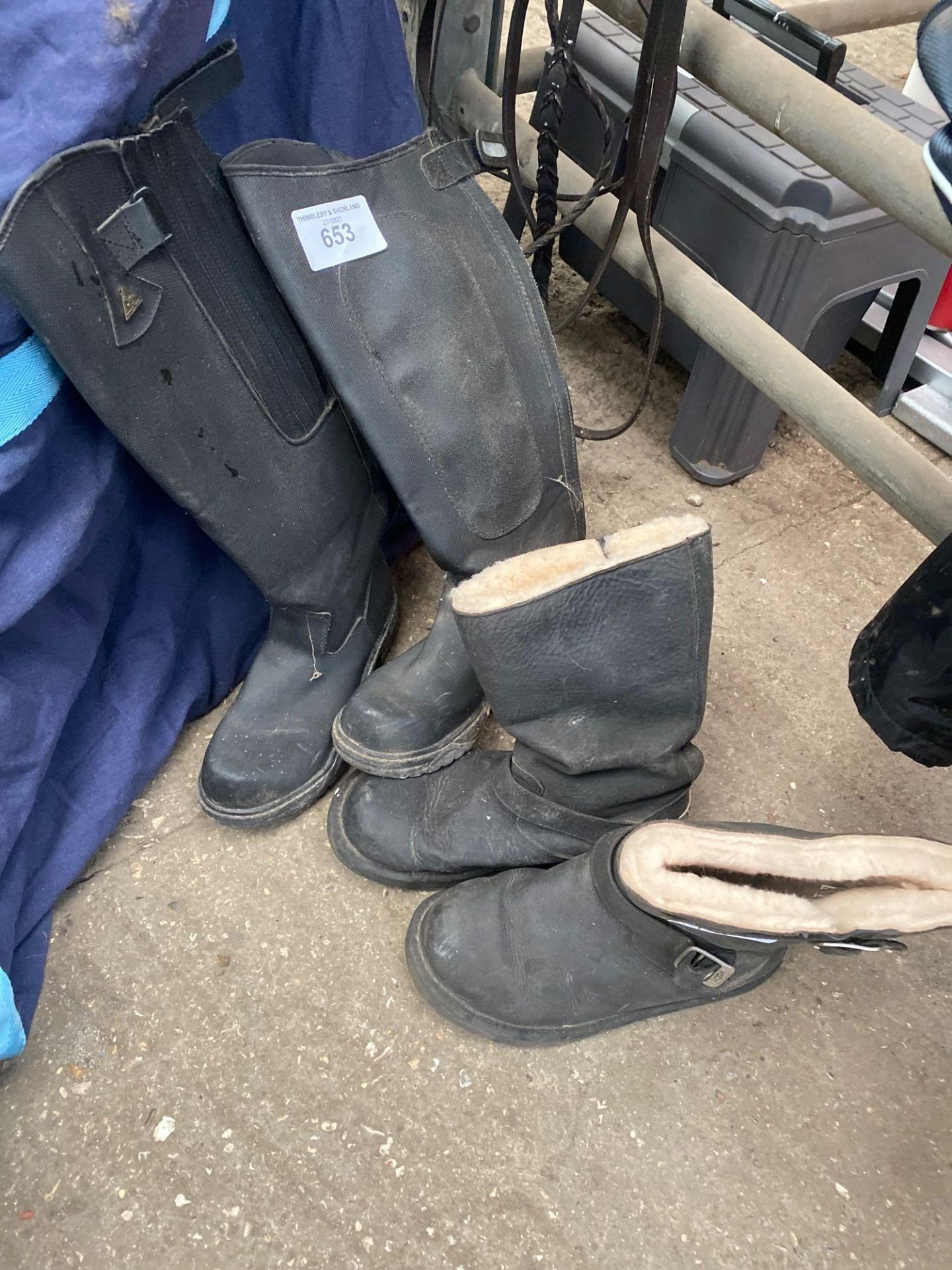 Pair of Mountain Horse long black thermal riding boots and a pair of UGG boots.