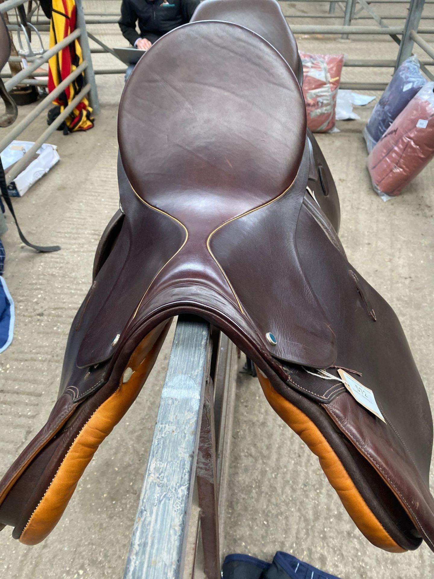 Brown leather saddle by Stubben, 18". This item carries VAT.
