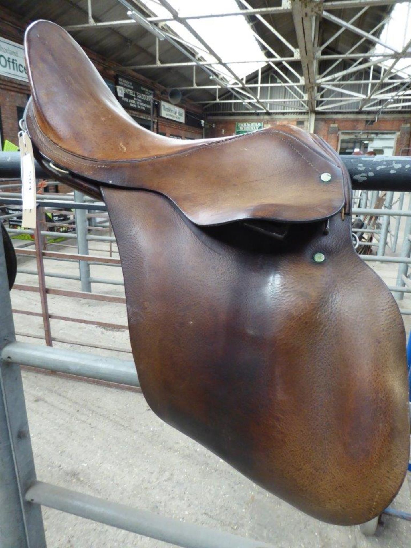 Brown leather hunting saddle by Barnsby & Son, Walsall.