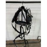 Set of black/whitemetal PAIR harness with 23ins collars with long breechings. This item carries VAT