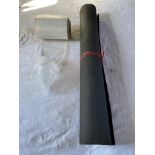 Roll of rubber matting, and a roll of clear polythene sleeve