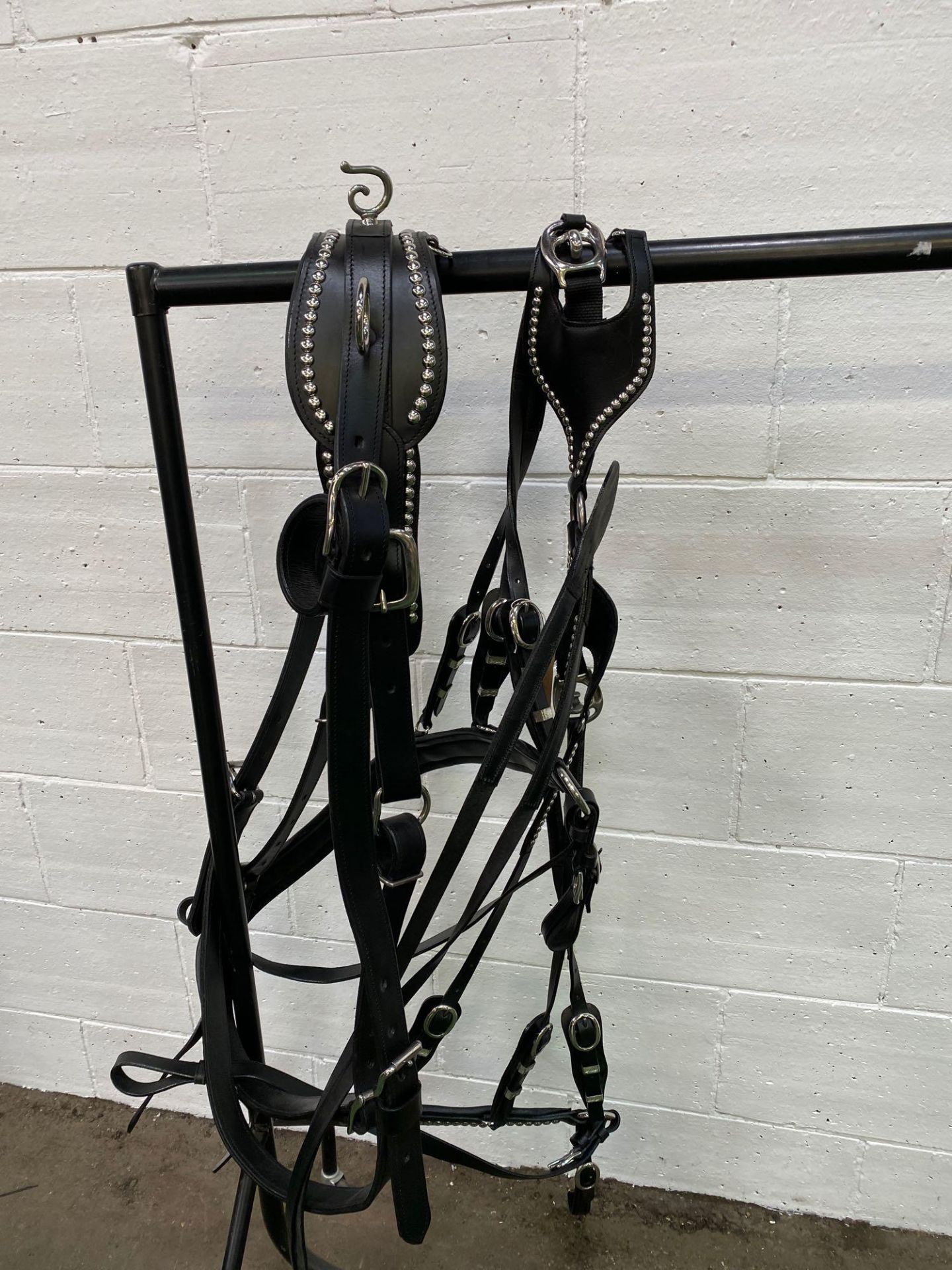 Set of heavy horse harness with collar. This item carries VAT.