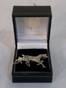 White metal brooch of a Hackney pony and foal.