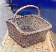 A small wicker basket with handle.