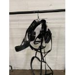 Set of black/whitemetal pony harness. This item carries VAT.