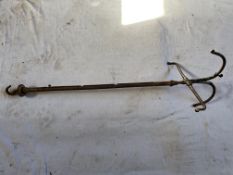 Antique harness cleaning hanger.
