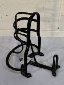 Black wrought iron harness rack for a bridle, pad etc.
