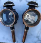 Pair of round fronted whitemetal and copper carriage lamps.