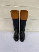 A pair of black leather Coachman's boots with tan tops. This lot carries VAT.