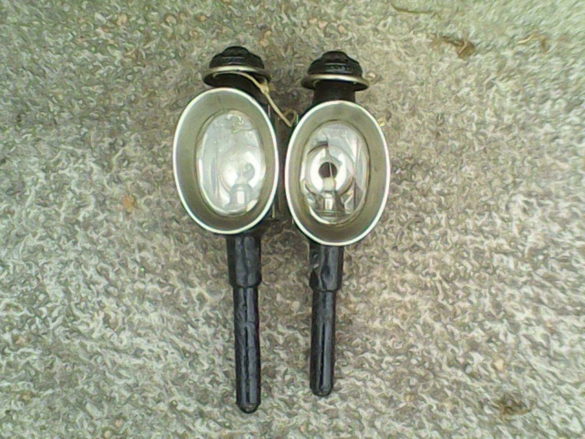 Pair of whitemetal carriage lamps.