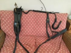 Set of English black/patent leather harness to fit a large horse, no bridle.