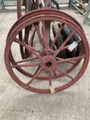 Two 35ins steel carriage wheels