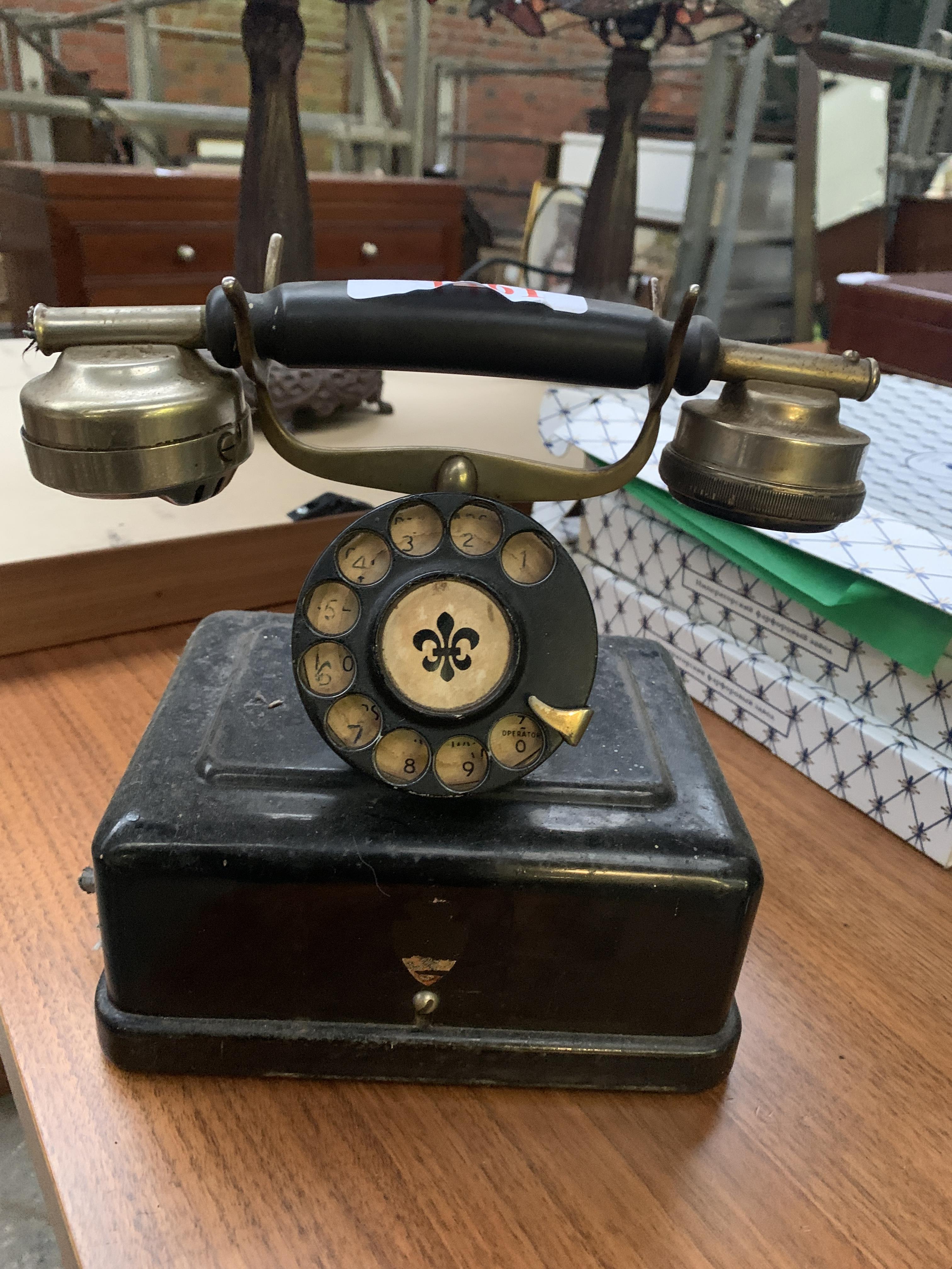 A Swedish rotary dial telephone
