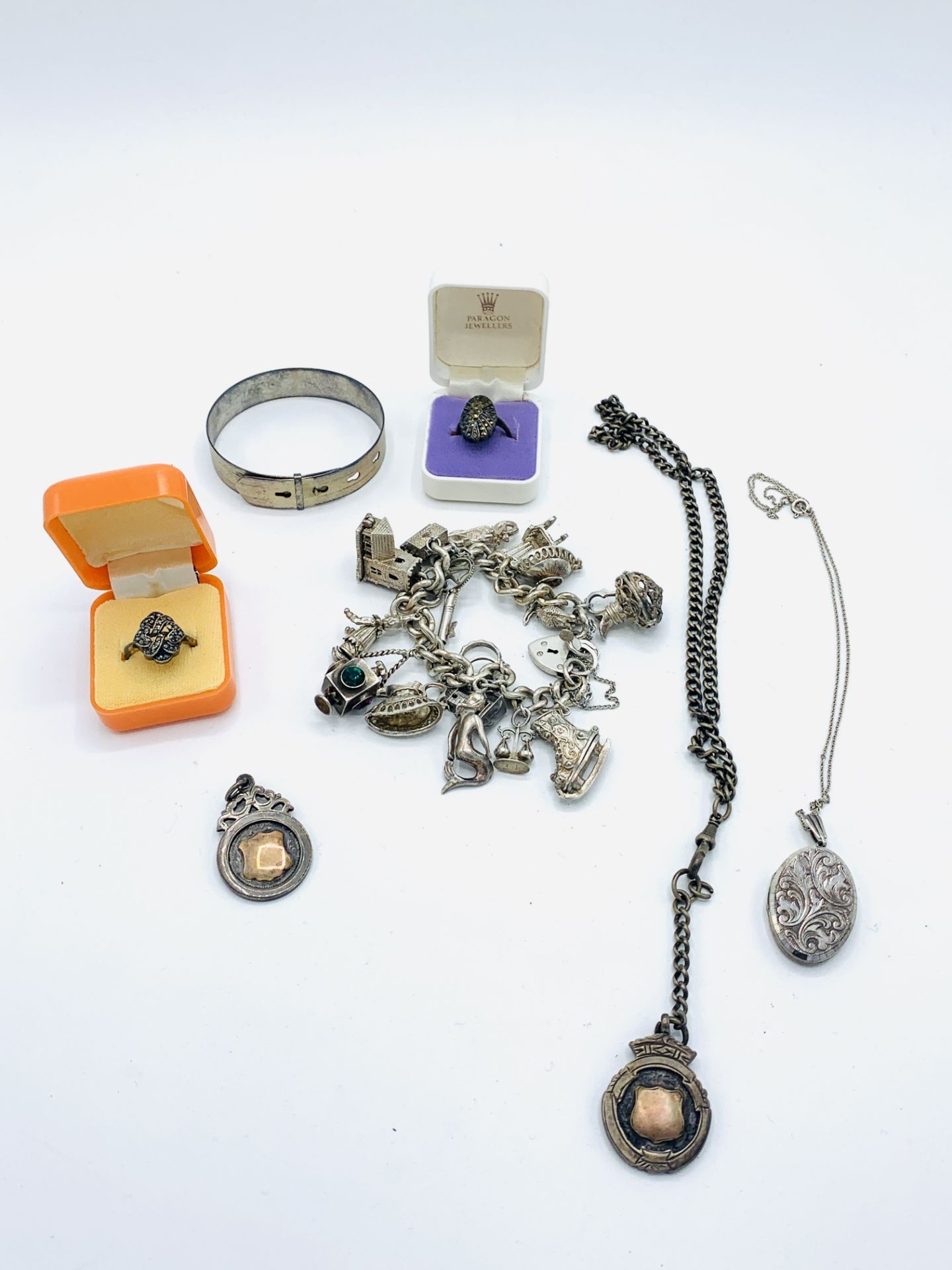 A silver charm bracelet and other silver jewellery