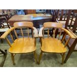 Two open arm chairs