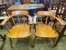 Two open arm chairs