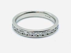 Platinum and diamond three quarter eternity ring