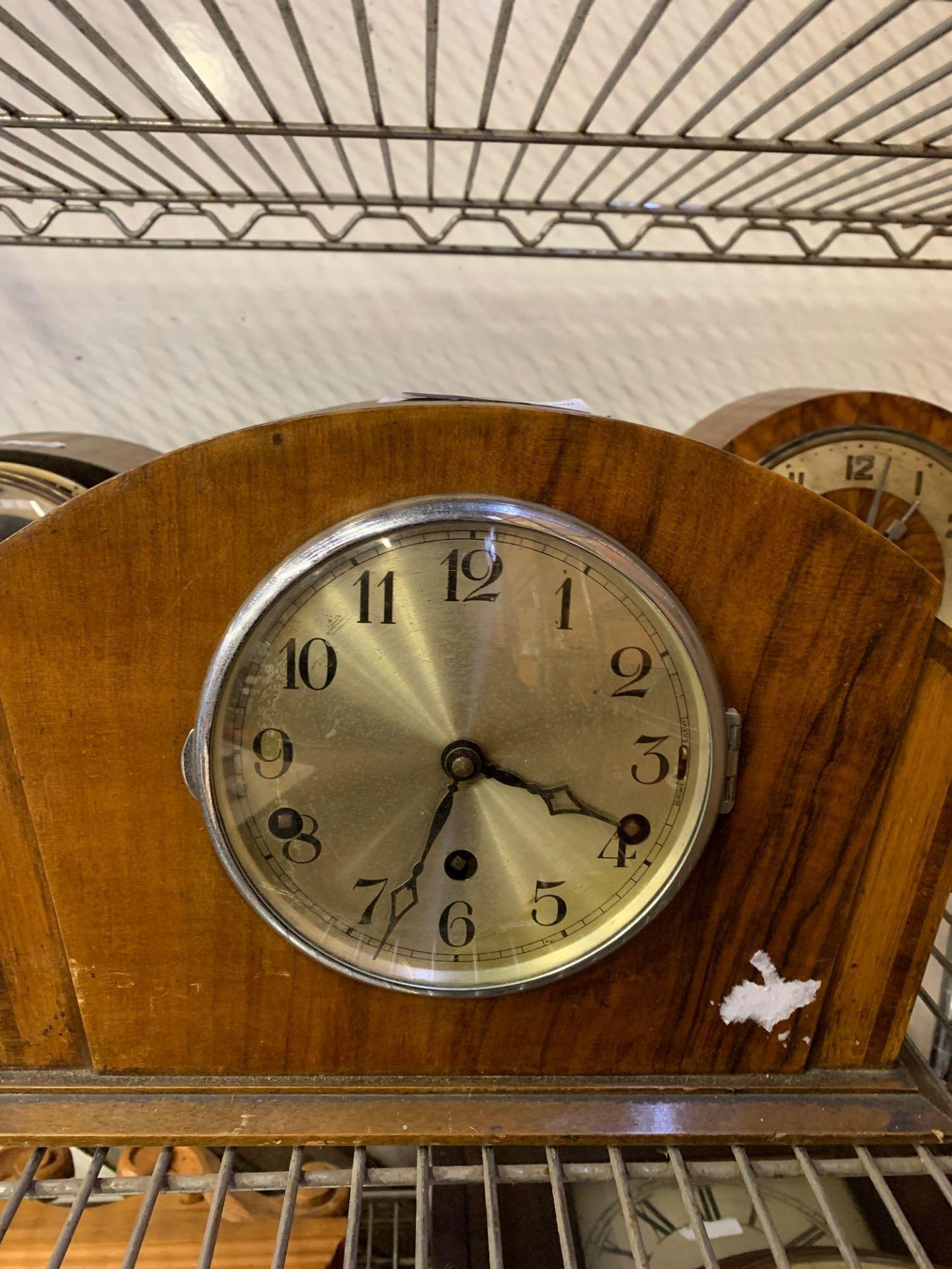 Three wood cased mantel clocks