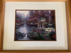 Three Thomas Kinkade prints together with a copy of 'Paintings of Radiant Light'