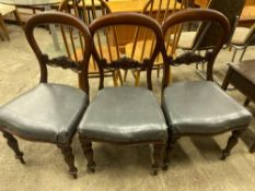 Three Victorian mahogany balloon back dining chairs