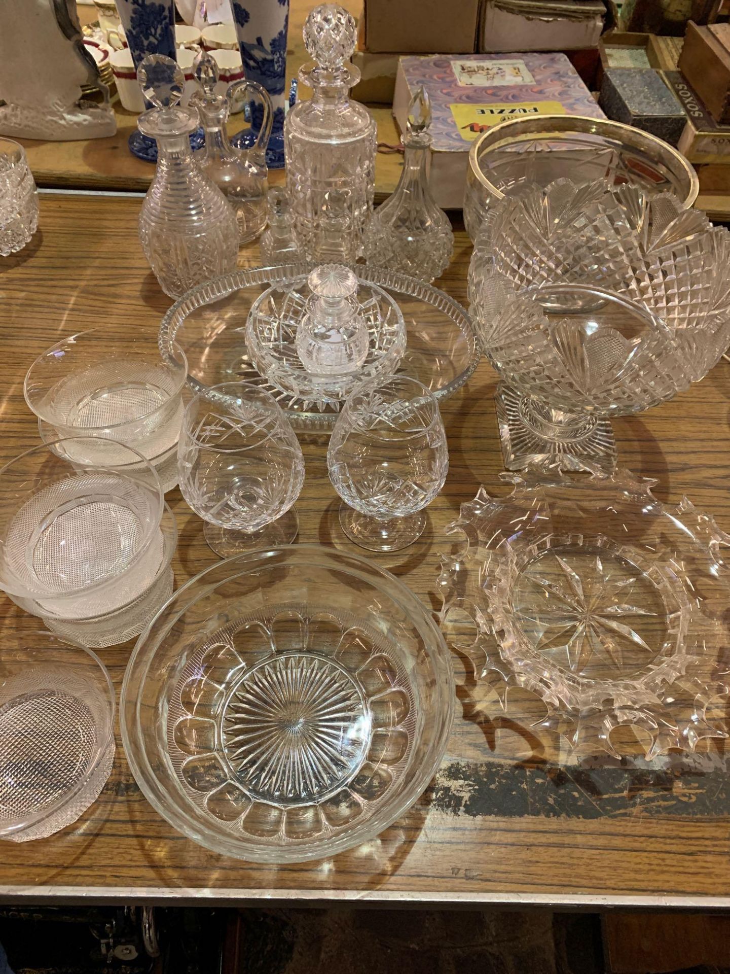 Three cut glass decanters and other cut glass items