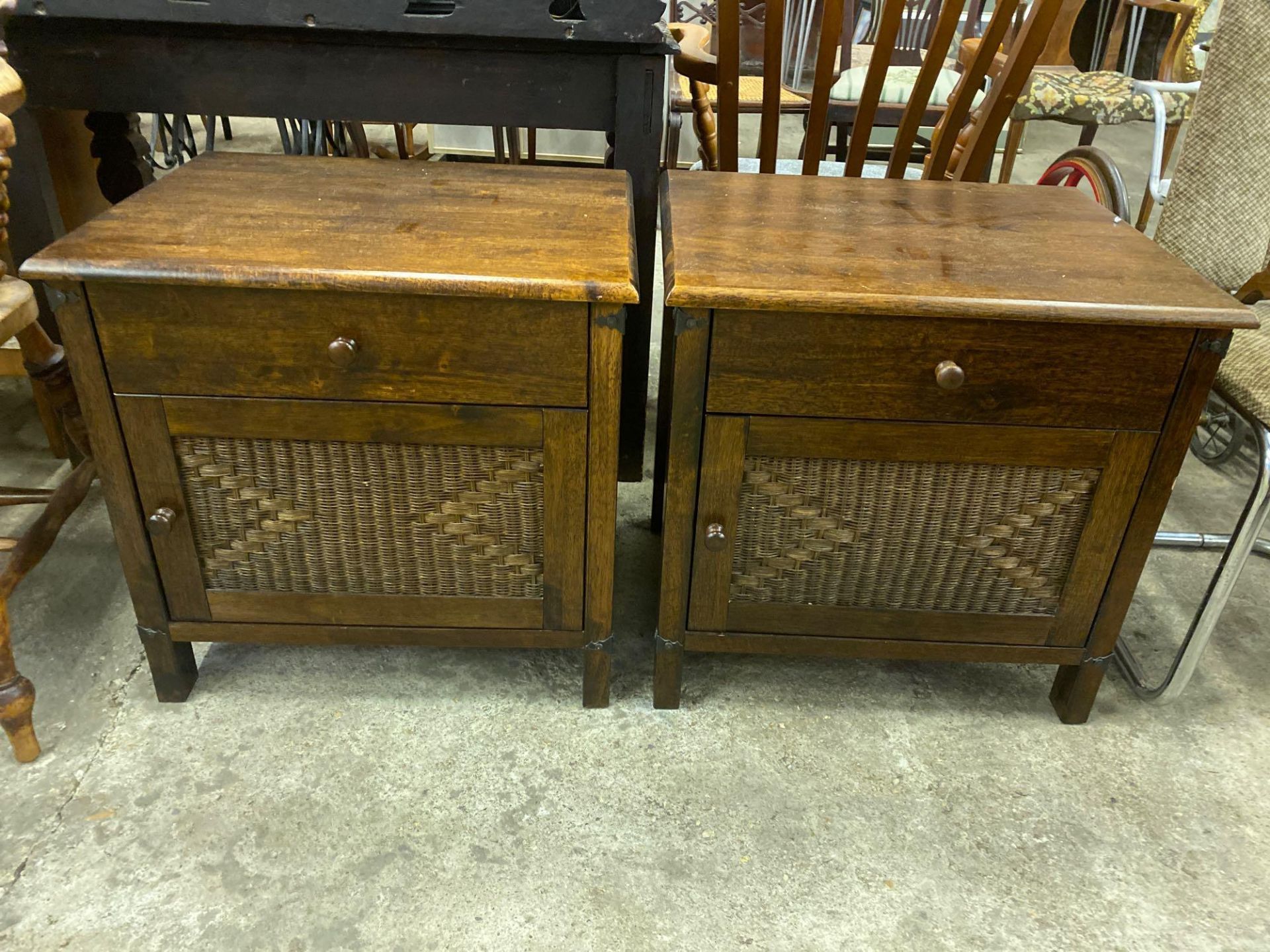 Two dark wood bedside cabinets