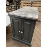 Two pine cabinets with marble tops