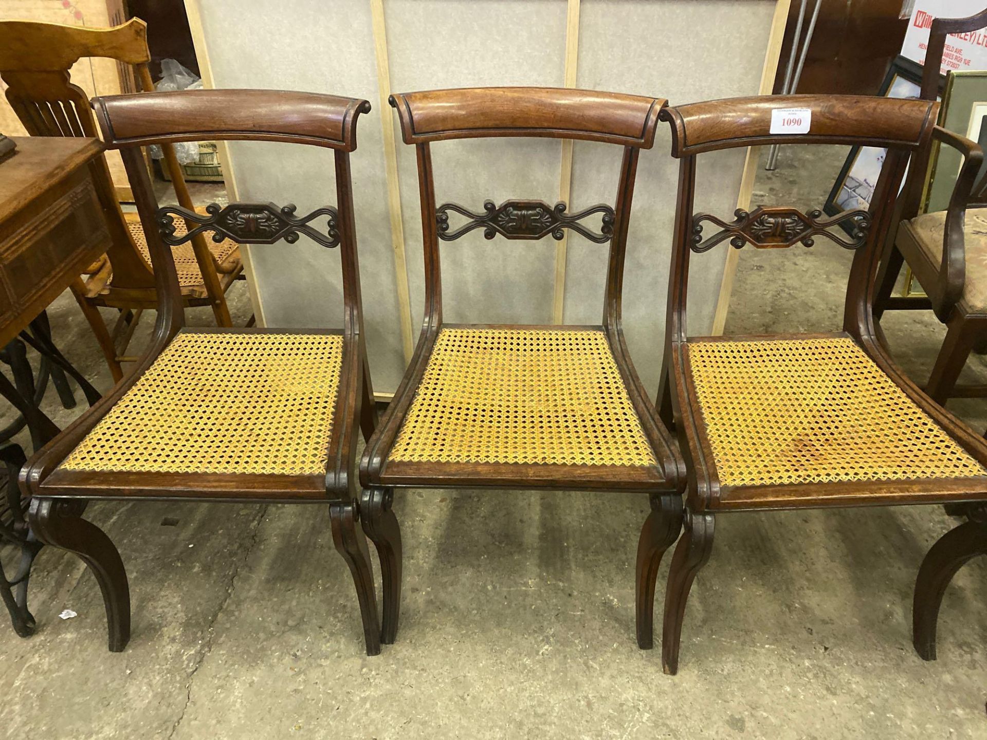 Three mahogany cane seat dining chairs