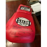 Signed boxing glove. This item carries VAT.