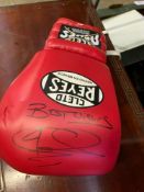 Signed boxing glove. This item carries VAT.