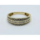 9ct gold ring set with 3 rows of diamonds