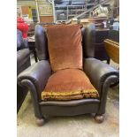 Dark brown faux leather deep wingback armchair